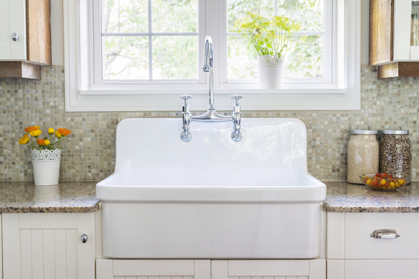 clean-looking kitchen sink in bright room