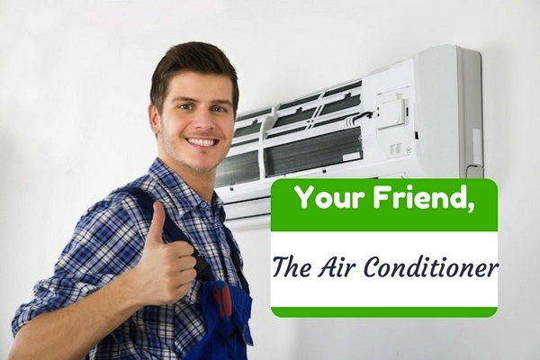 Man in overalls giving thumbs up next to wall-mounted HVAC system