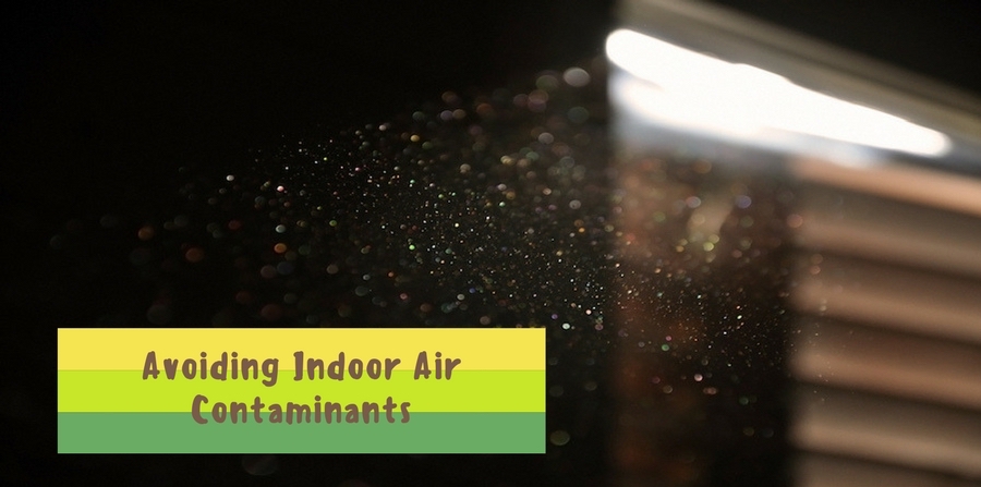 dust floating in the air, visible from beam of sunlight coming from partially opened blinds on window. "Avoiding Indoor Air Contaminants"