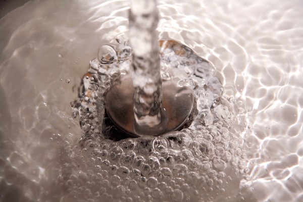 water gurgles in kitchen sink pipes after water drains