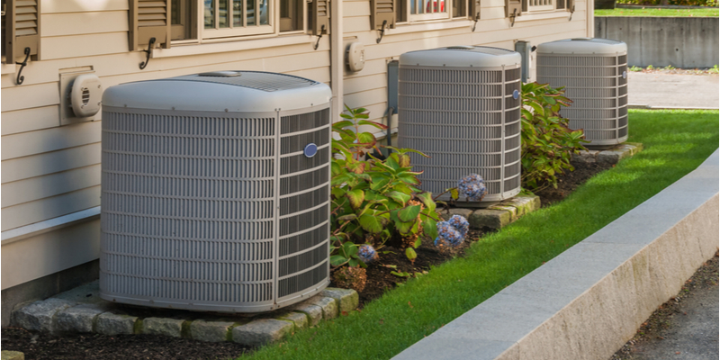 AC units in a row outside a home