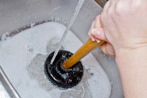 Plunging to unclog a bathroom sink