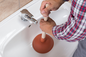 Unclogging a bathroom sink