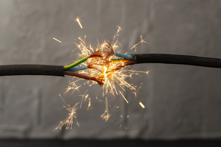 sparks explosion between electrical cables, fire hazard concept